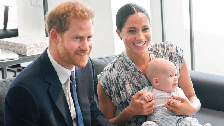 Britain&#39;s Prince Harry and his wife Meghan, Duchess of Sussex, holding their son Archie, meet Archbishop Desmond Tutu at the Desmond & Leah Tutu Legacy Foundation in Cape Town, South Africa, September 25, 2019. REUTERS/Toby Melville/Pool