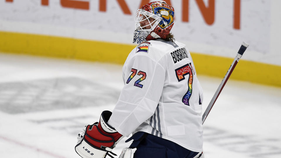 Russian NHL goaltender Sergei Bobrovsky warms up while wearing a Panthers Pride Night jersey. (AP Photo/Michael Laughlin)