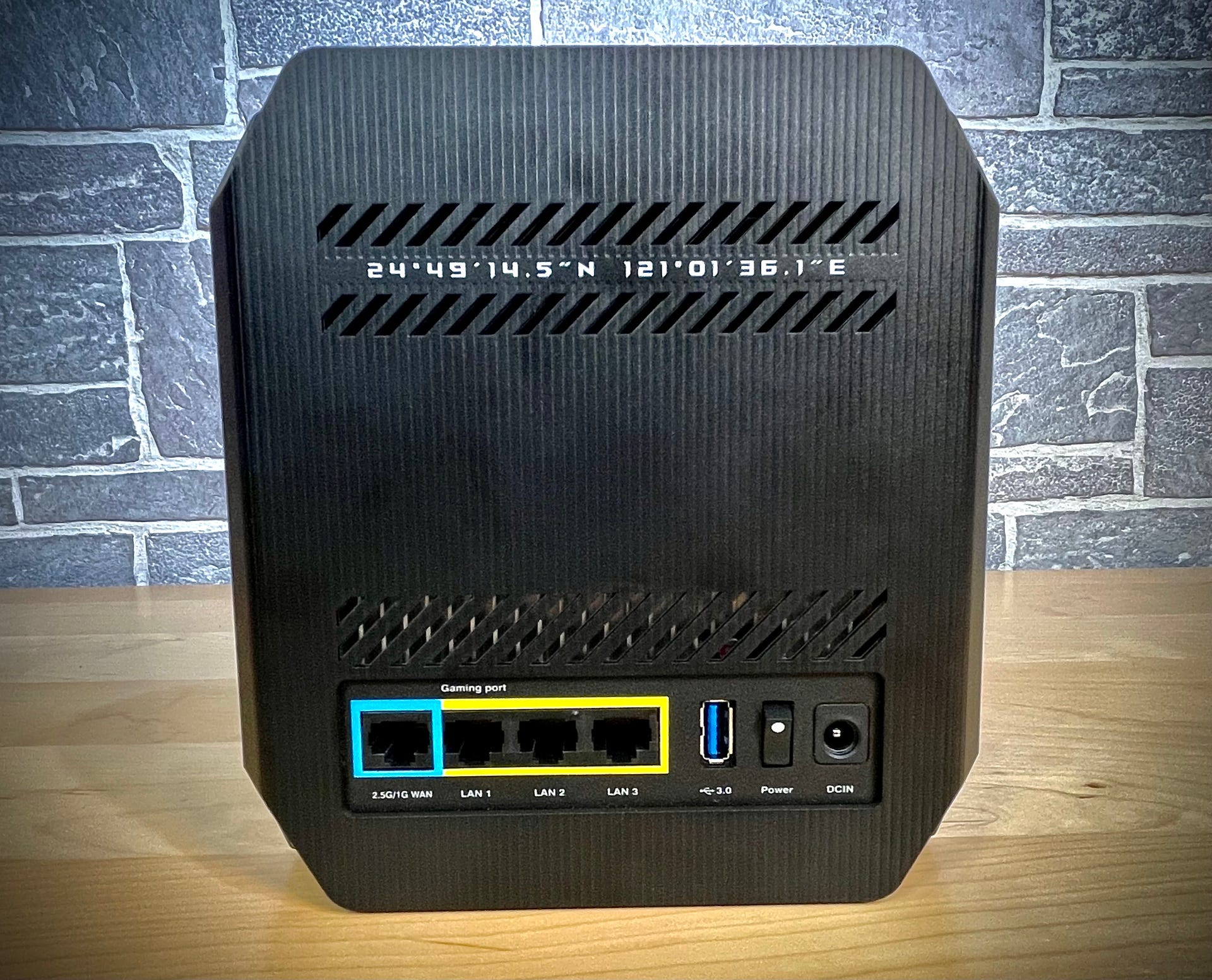 A close look at the back of an Asus Rog Rapture GT6 mesh gaming router reveals a physical power switch, a 2.5Gbps WAN port, three spare gigabit Ethernet LAN ports, a USB 3.2 port, and the A/C power port.