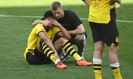 England’s Jude Bellingham is comforted after Borussia Dortmund lost out in their title battle with Bayern Munich on the final day.