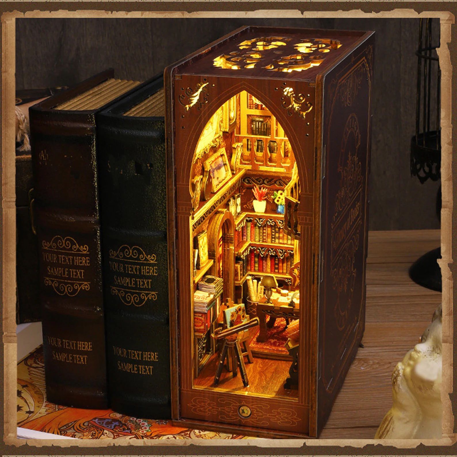 miniature room that fits among books on a bookshelf