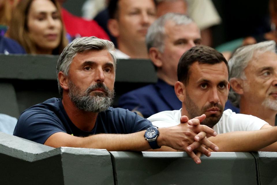 Djokovic&#x002019;s coach Goran Ivanisevic (left) watches on at Wimbledon, where he was champion in 2001 (Getty Images)