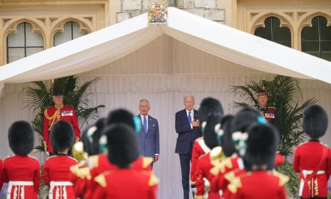 King Charles III and the US president, Joe Biden, inspect the guard of honour from the Prince of Wales’s Company of the Welsh Guards, in the quadrangle at Windsor Castle.