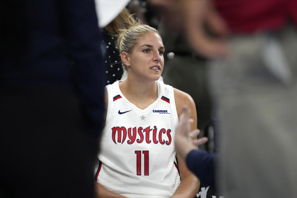 Washington Mystics&#39; Elena Delle Donne listens to head coach Eric Thibault during a WNBA basketball game against the Chicago Sky Thursday, June 22, 2023, in Chicago. (AP Photo/Charles Rex Arbogast)