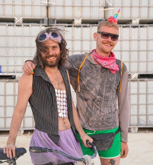 Dave and Phil, who gave their hometown as Black Rock City, pose for a photo at Burning Man.