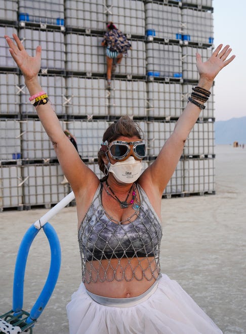 Barb Gottesman of California poses for a photo at Burning Man.