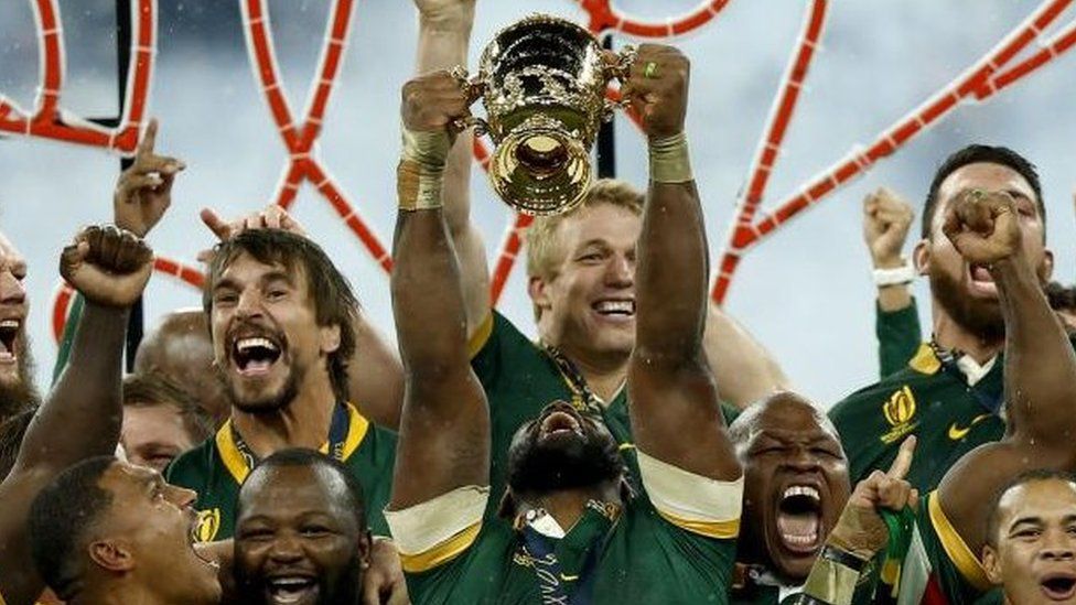 Springboks captain Siya Kolisi holds the World Cup above his head