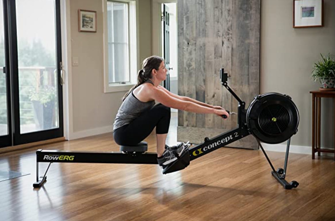 Woman excising on Concept2 Model D rowing machine