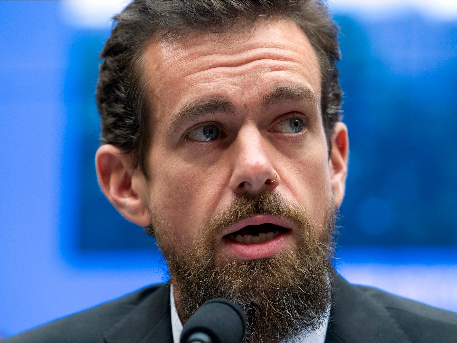 Jack Dorsey speaking into a microphone.