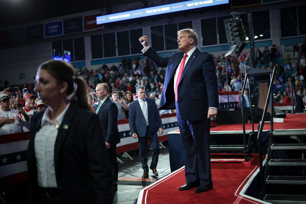 Donald Trump gestures to members of the audience in Conway, South Carolina.