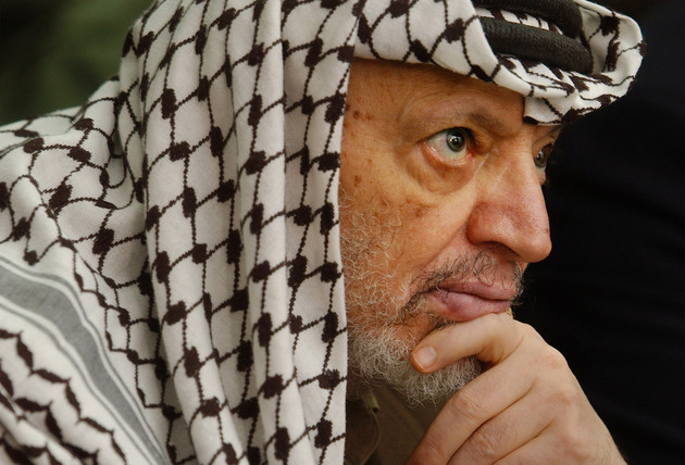 Yasser Arafat attends Friday prayers at his headquarters in the West Bank town of Ramallah.