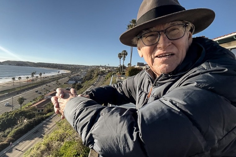 Following the latest round of storms in California, Dana Point resident Edward looks out over his seaside home amid concerns of landslides and eroding beaches. 