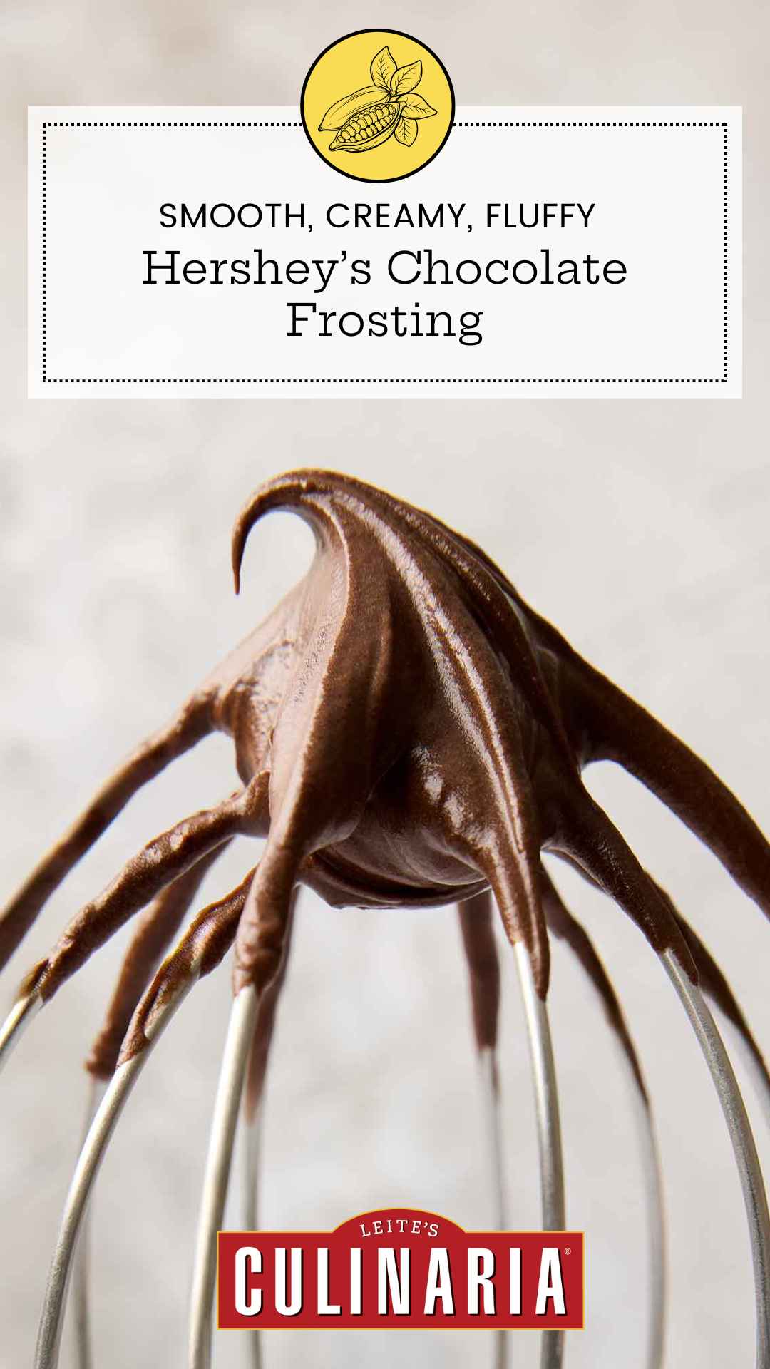 Chocolate frosting on a wire mixer whisk.