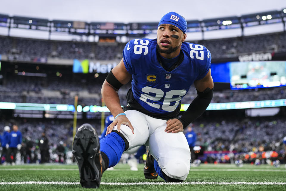 EAST RUTHERFORD, NJ - JANUARY 07: Saquon Barkley #26 of the New York Giants warms up prior to an NFL football game against the Philadelphia Eagles at MetLife Stadium on January 7, 2024 in East Rutherford, New Jersey. (Photo by Cooper Neill/Getty Images)