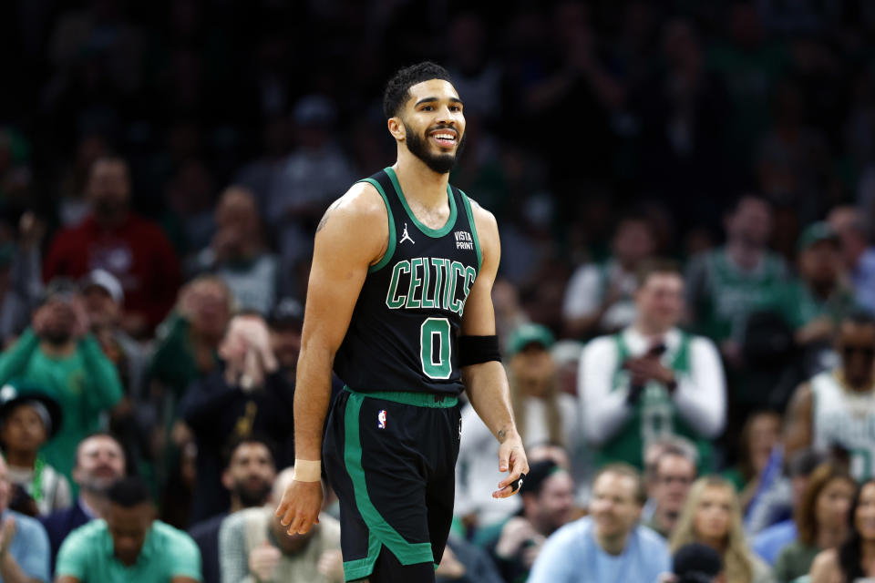 Jayson Tatum and the Celtics are favored to win the NBA championship. (Photo by Danielle Parhizkaran/The Boston Globe via Getty Images)