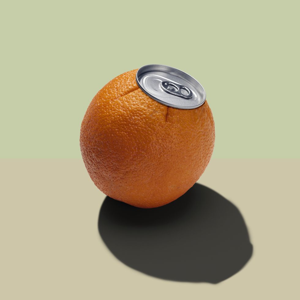 an orange with a watch on it