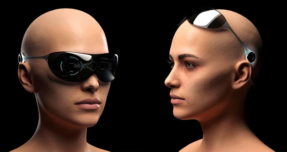 Photo of two female shaved heads wearing sunglasses that have a retinal display and a neural link above one ear.