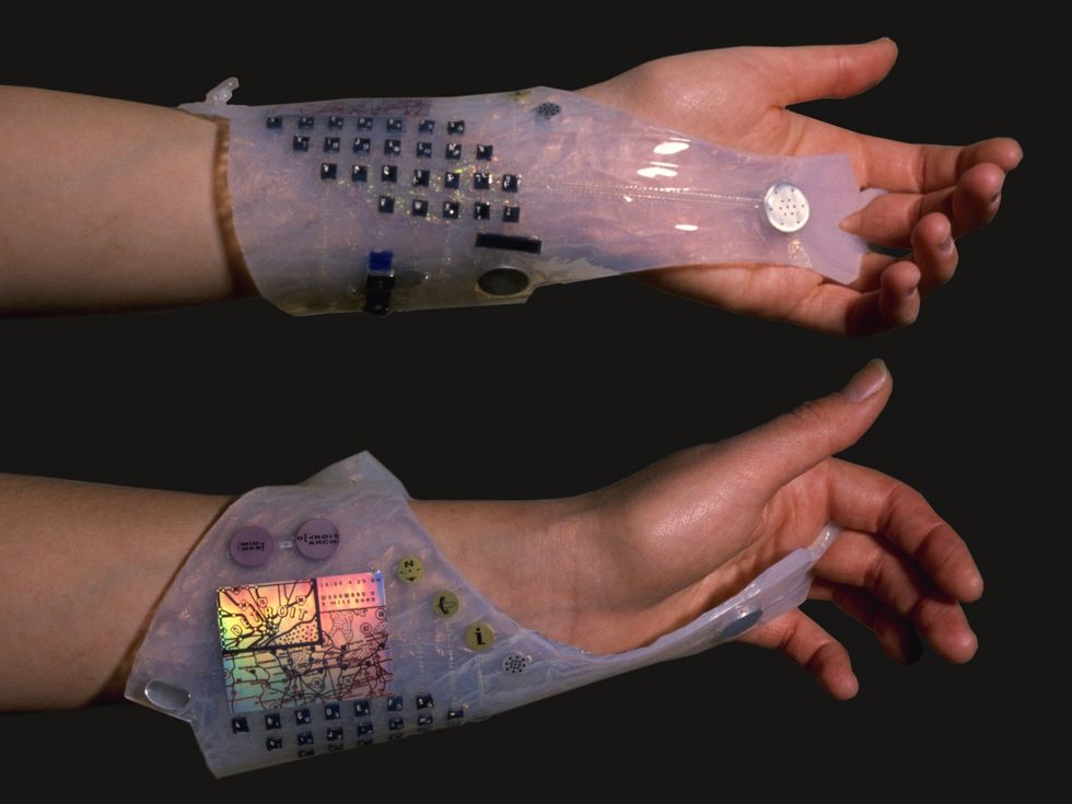 Two photos of a translucent wristband with embedded electronics.