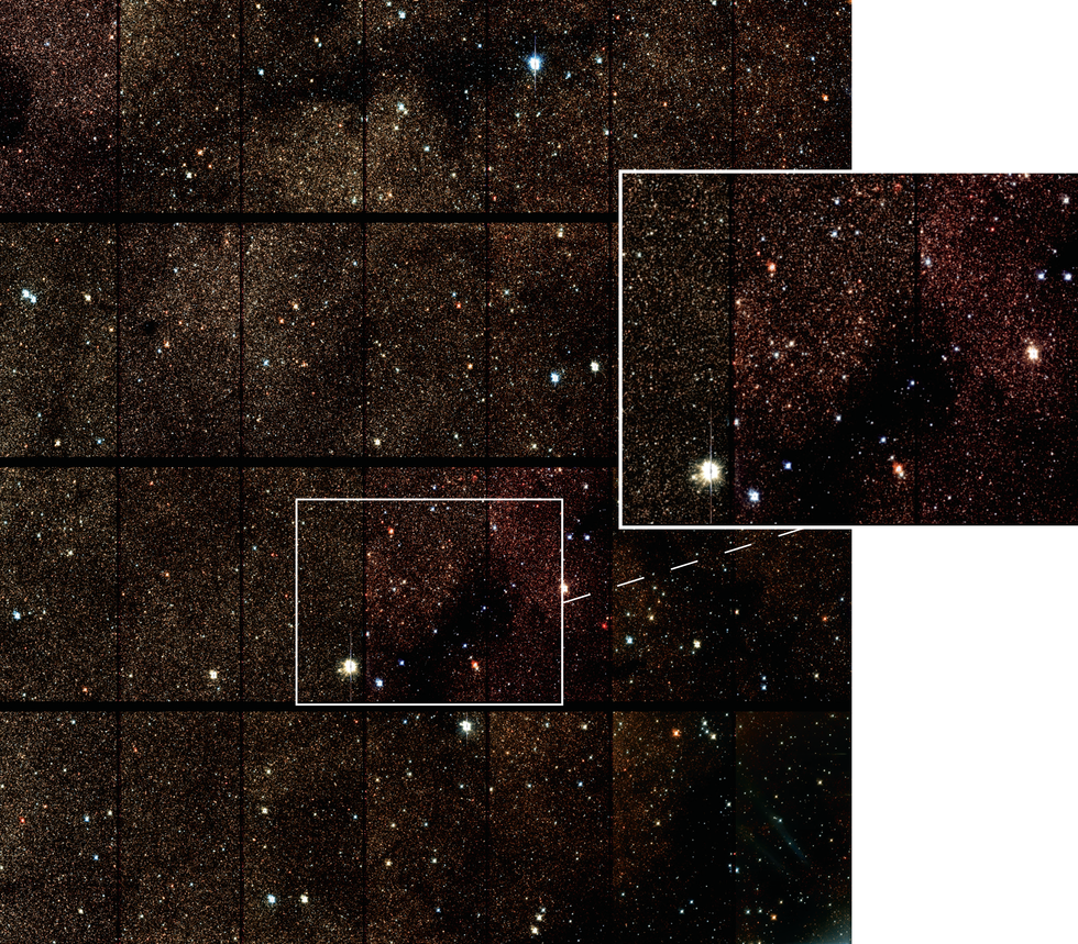 An image of a starfield with a magnification in the center.