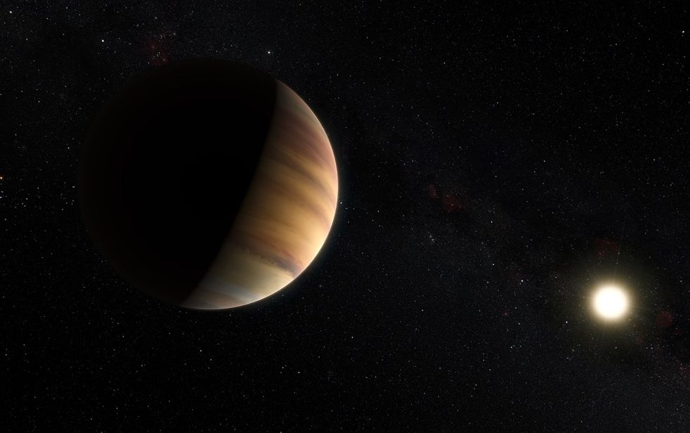 Artistu2019s rendering of a large planet and a much smaller star against a black background.