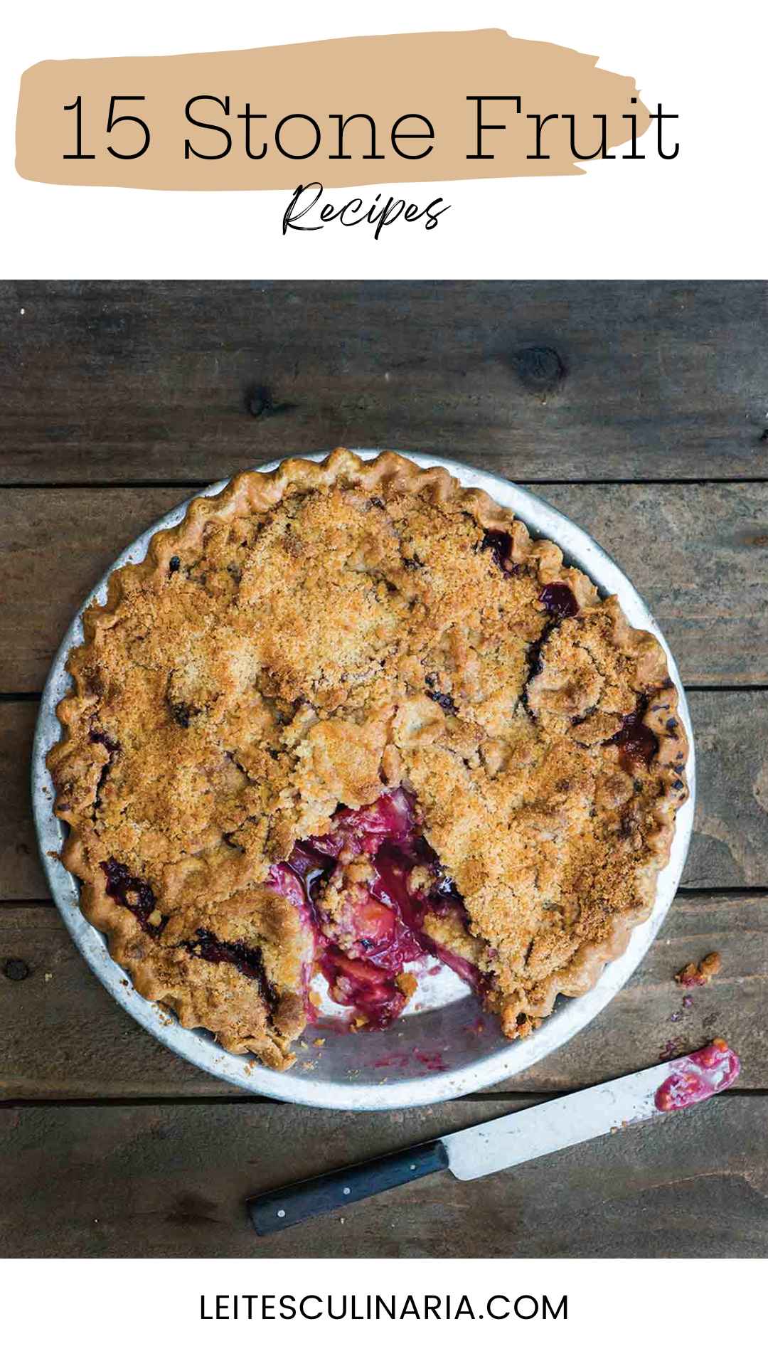 A plum pie topped with crumble with one piece missing from the pie.