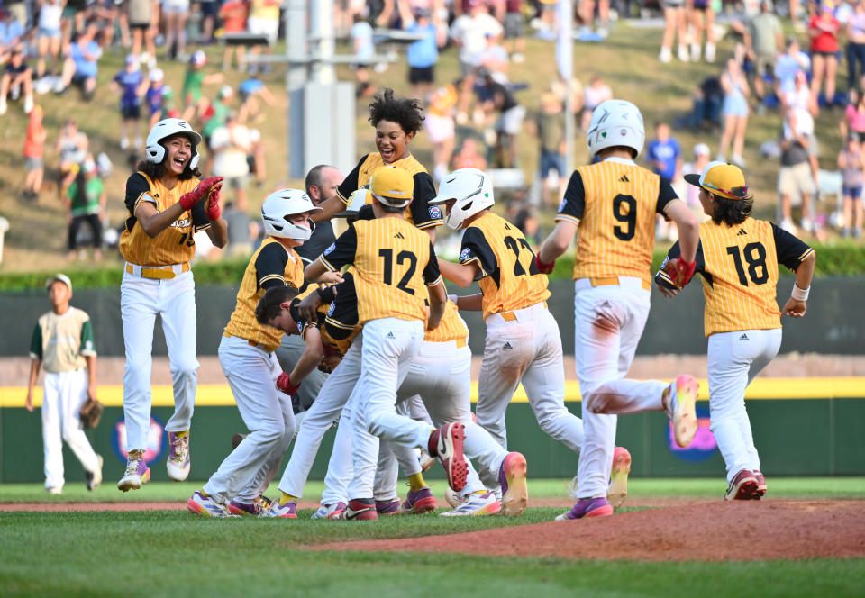 Florida players celebrate securing the state's first Little League World Series title. (Kyle Ross/Reuters)