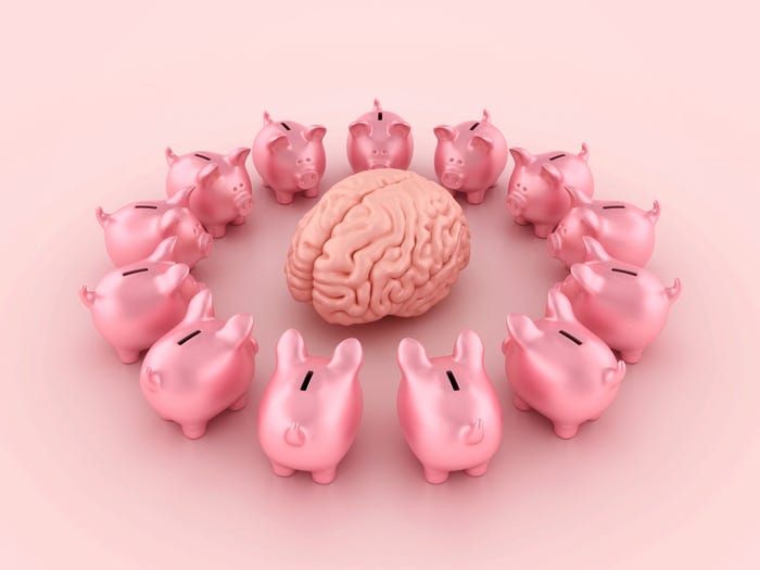 Human brain surrounded by piggy banks