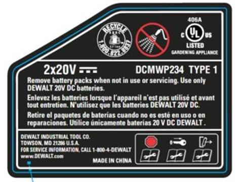 The model number is printed on the rear door of the mower