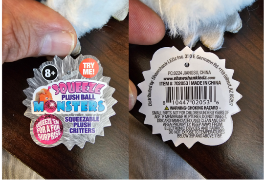 Removable hang tag on the recalled Squeeze Plush Ball Monsters Toy