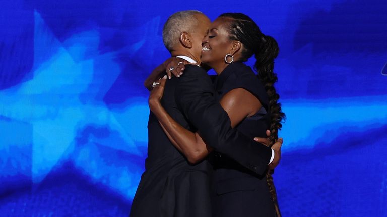 Barack Obama embraced Michelle Obama after she introduced him. Pic: Reuters