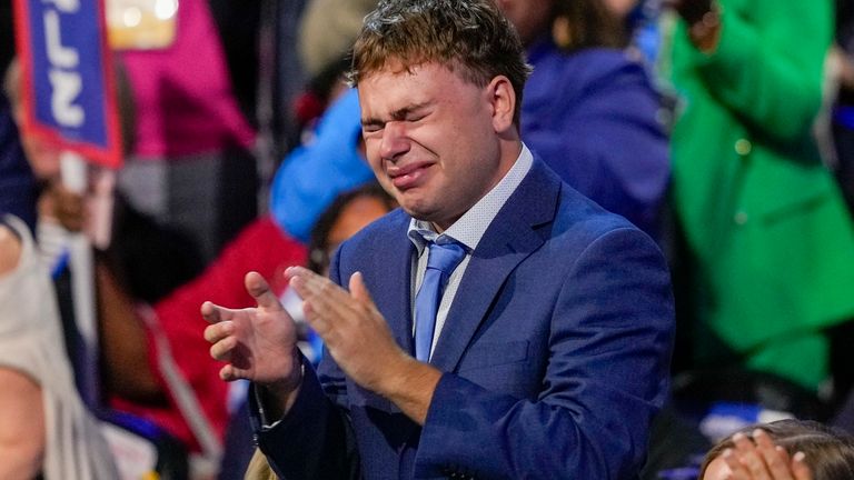 Tim Walz's son Gus became emotional during the speech. Pic: AP