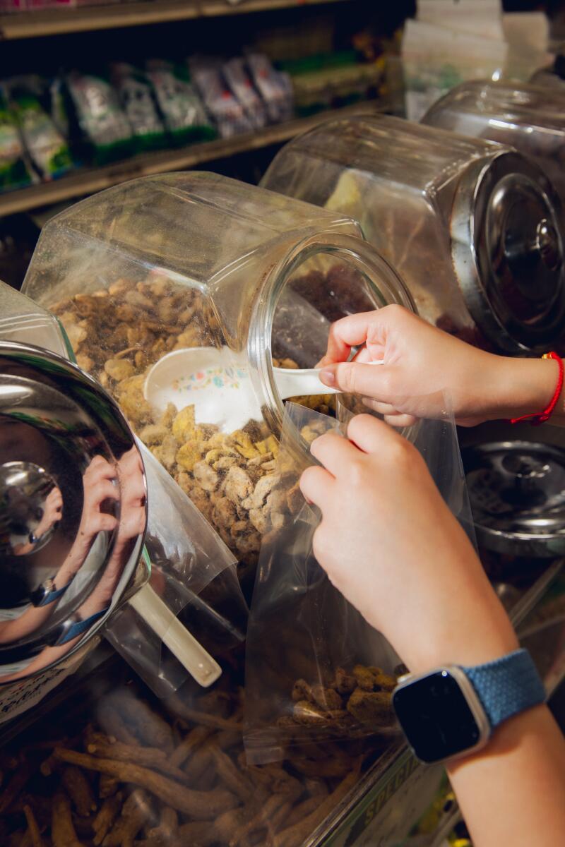 A container of dried fruit at Tian Xiang.