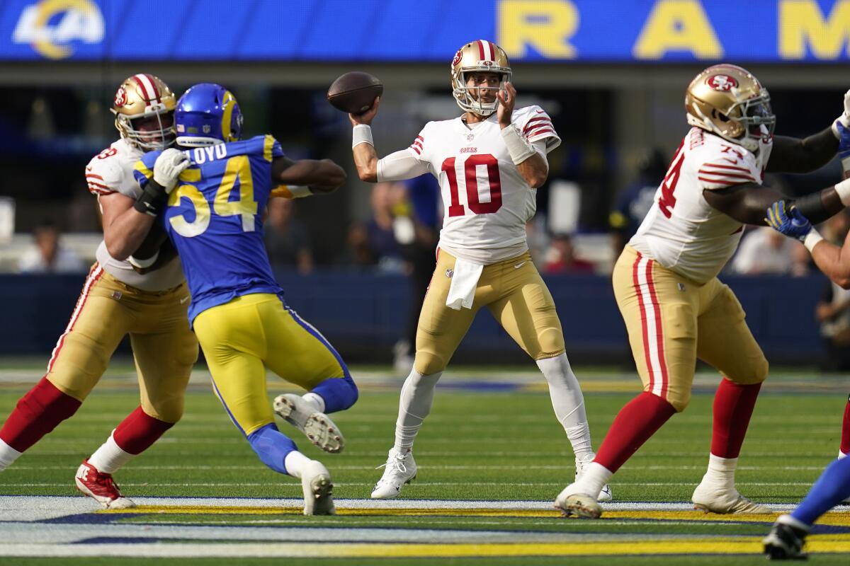 San Francisco 49ers quarterback Jimmy Garoppolo passes against the Rams in 2022.