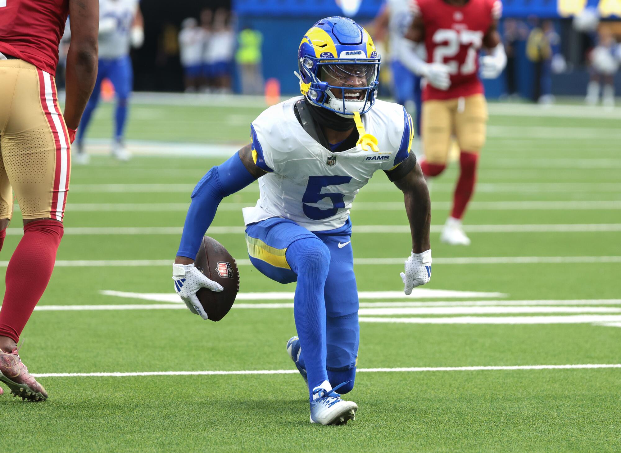 Rams wide receiver Tutu Atwell celebrates after making a 50-yard catch in the fourth quarter.