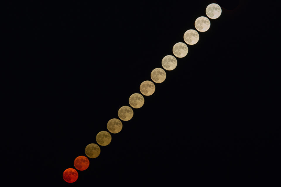 A photo compilation of 14 interval shots of the full harvest moon in Calascio, Italy