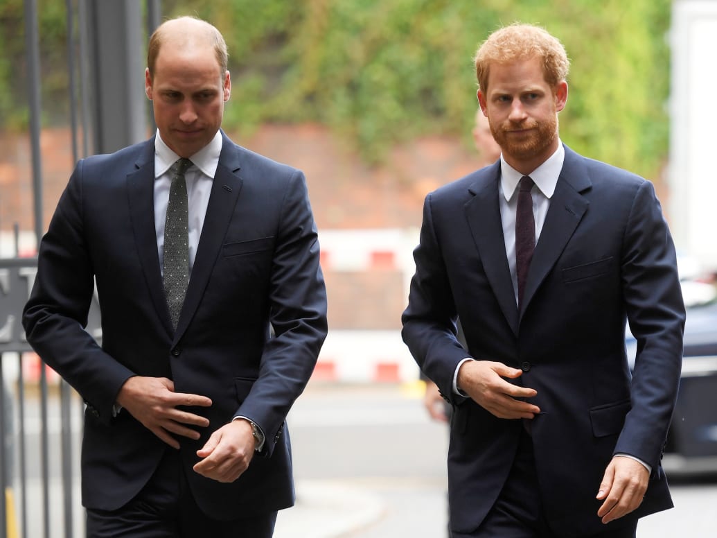 Prince William, left, and Prince Harry arrive to visit the Support4Grenfell Community Hub in London, September 5, 2017.