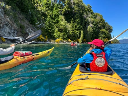 The family kayaking on Nahuel Huapi Lake in northern Patagonia.