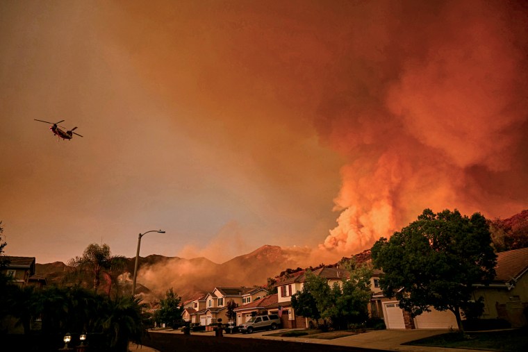 A neighborhood under smoke.