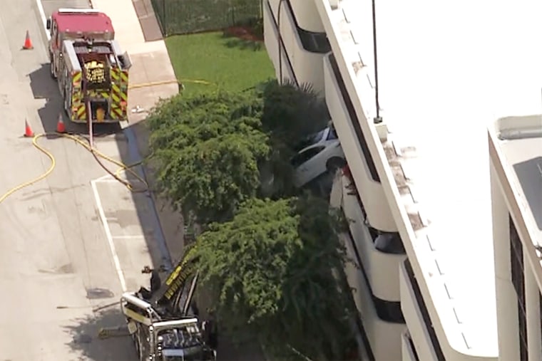 porsche suv accident coral gables parking garage