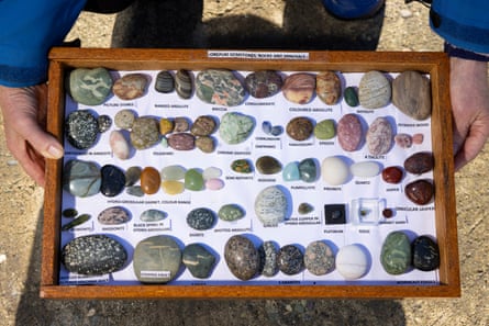 Invercargill rock collector Marion Troon has been fossicking at Gemstone Beach since the mid-’90s. Here she shows a board presenting the variety of precious stones that she sourced from the beach.