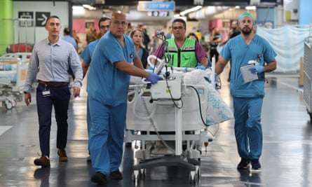 A medical team transports a patient to Rambam hospital's underground emergency facility in Haifa, northern Israel