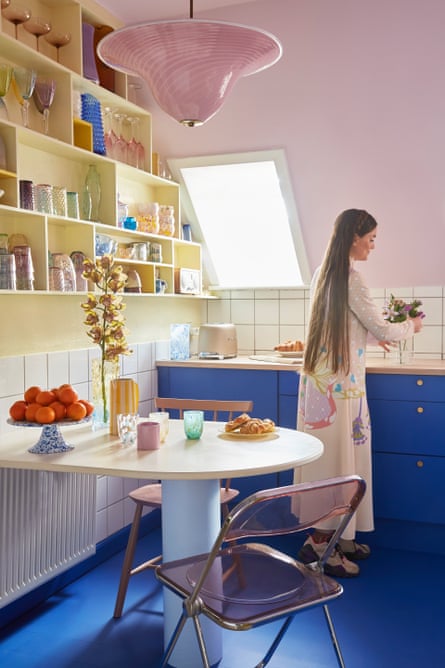 In the pink: the kitchen, complete with Murano glass light shade.