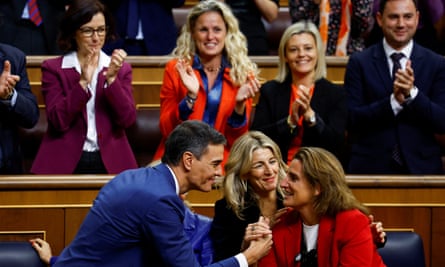 Pedro Sánchez, shakes hands with Teresa Ribera