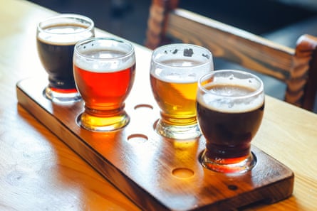 A flights of beers in small glasses