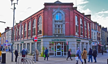 People passing by the Lloyds Bank building in Bridgend