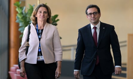 Teresa Ribera and Stéphane Séjourné walking side by side