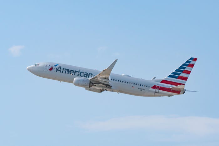 An American Airlines plane taking off.