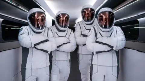 SpaceX Four Space X astronauts in their upgraded space suits