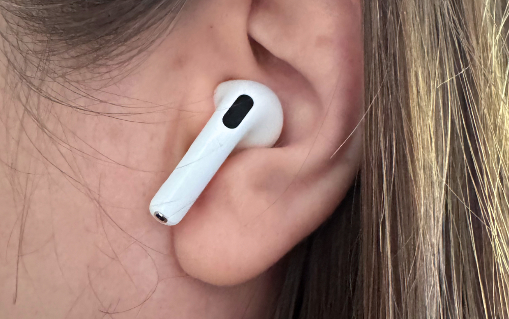 AirPods 4 with Active Noise Cancellation in an ear.