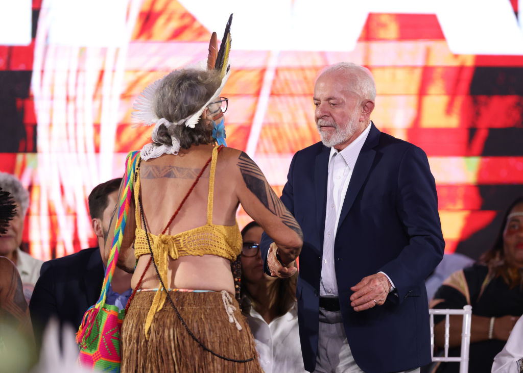 President of Brazil Luiz Inacio Lula da Silva greets an indigenous leader of Tupinambá tribe during a ceremony to commemorate the return to Brazil of the 'Tupinambá Cape' at Museu Nacional in Rio de Janeiro, Brazil, 2024.